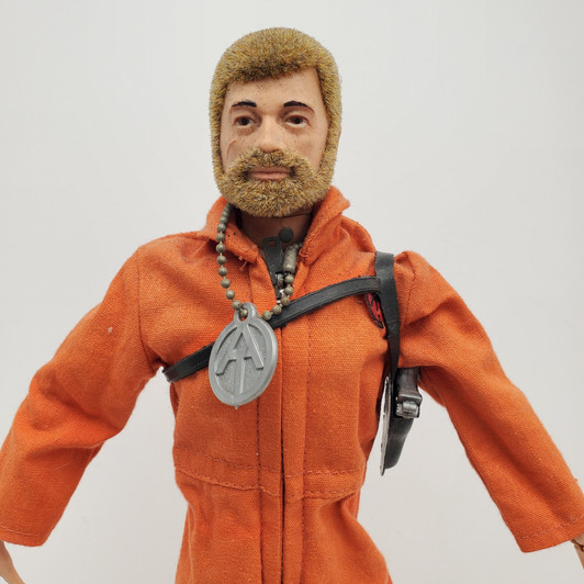 Hasbro (1974) GI JOE Adventure Team Blonde hair action figure in Orange jump suit