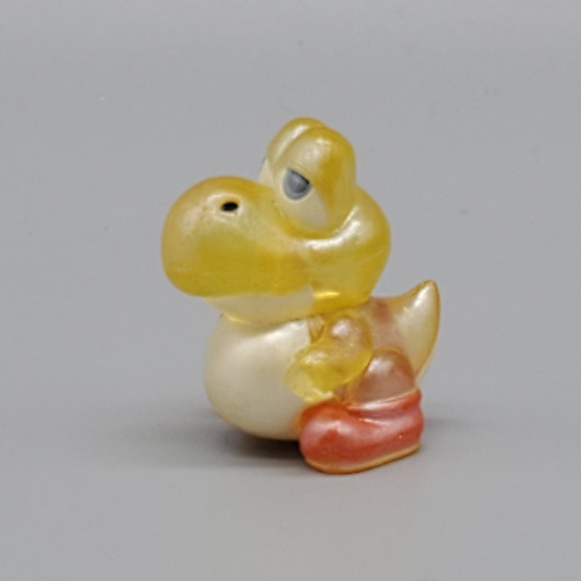 Medicom UDF Super Mario U Clear Yellow Yoshi
Figure is approx 1.5" tall.