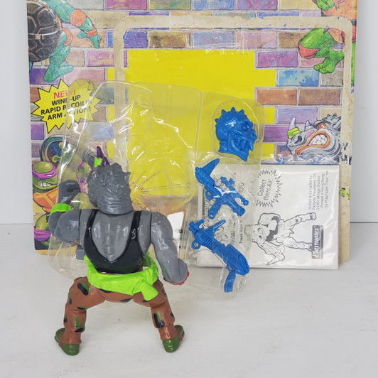 Playmates (1991) TMNT Wacky Action Machine Gunnin' Rocksteady action figure with card