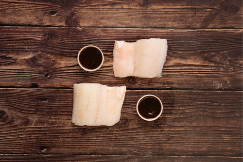 2 Haddock Fillets portions with a blackened Miso sauce 2 Haddock Fillets portions with a blackened Miso sauce