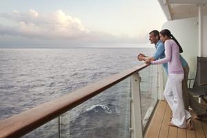 Couple Enjoying Cruise Ship Balcony Couple Enjoying Cruise Ship Balcony