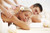 Couple Enjoying A Massage Couple Enjoying A Massage