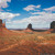 The Mittens rising from the desert floor at Monument Valley