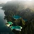 Coron Island from the air, its limestone ridges enclosing several turquoise lagoons in morning light