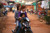 Sihanoukville Fishing Village Moped Girls