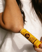 Cocoa Butter Stick in use