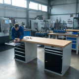 Workbench with 2 drawer casings 24G, 1 cupboard, height 850 mm, Beech Strips worktop, 20×20G, Worktop length: 2000mm in use