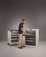 Man opening Garant gridline Tool Cabinet