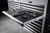 Garant Gridline Tool cabinet open drawer with custom foam inlay filled with tools.
