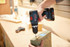Bosch 18V EC Brushless Connected-Ready 1/2 In. Hammer Drill/Driver with (1) CORE18V® 4 Ah Advanced Power Battery in use alternate view