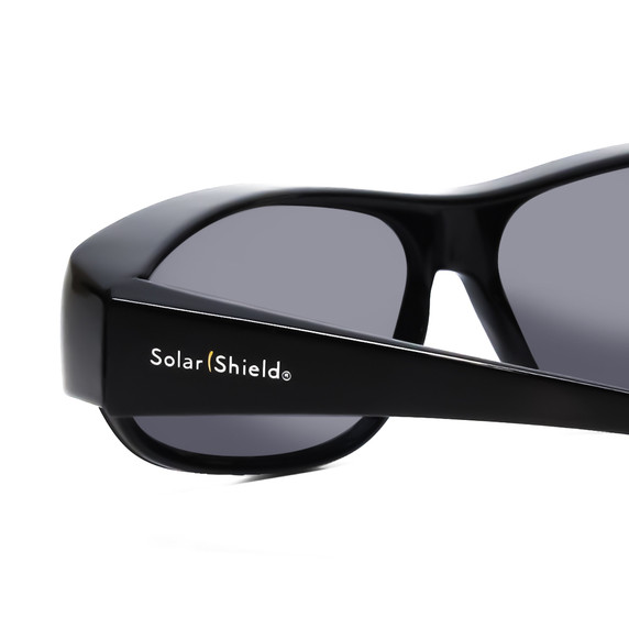Close Up View of Foster Grant Unisex Oval Semi-Rimless 70 mm Fitover Sunglasses Black /Smoke Grey