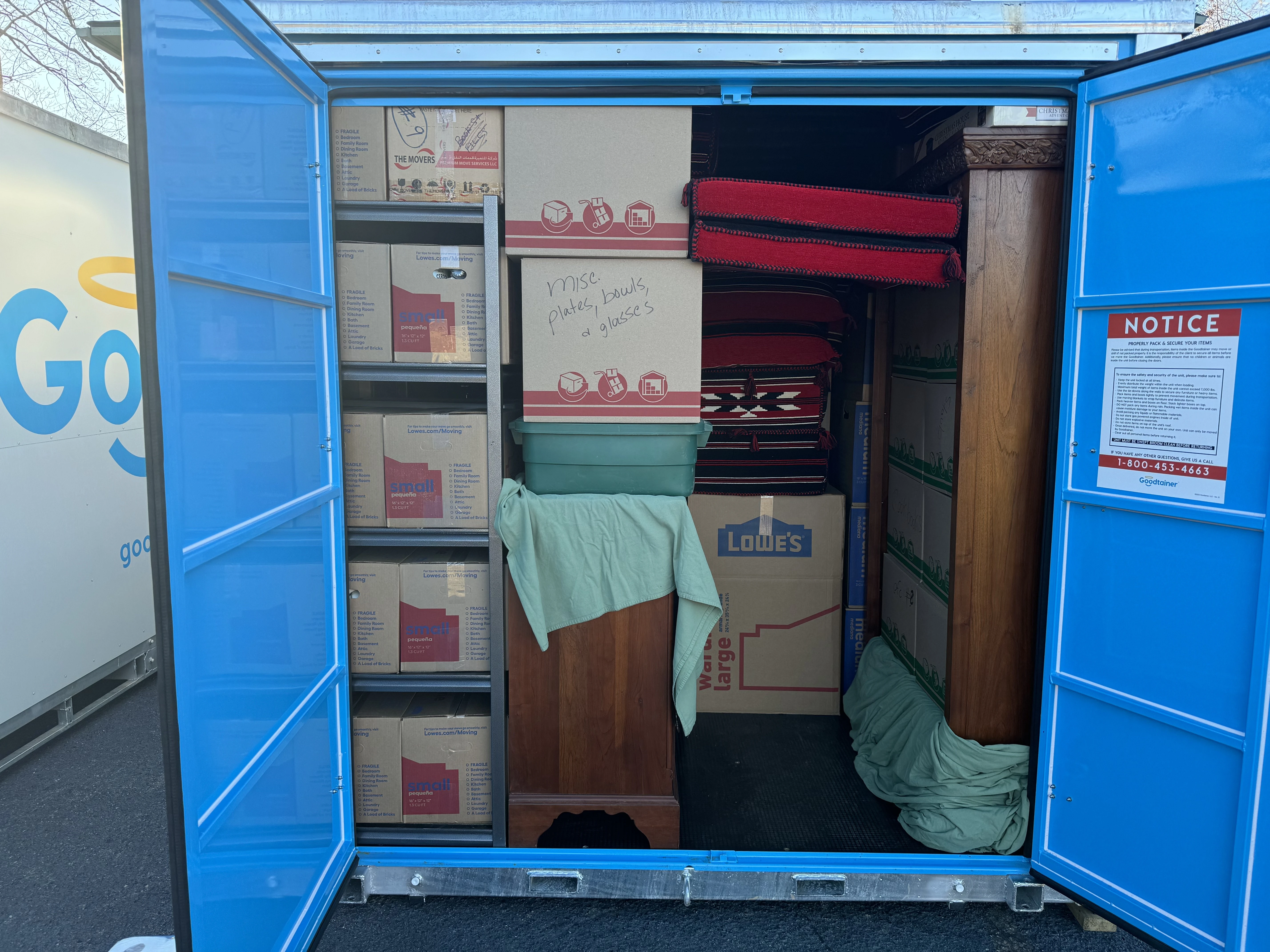 A Goodtainer storage container packed tightly with household belongings during a Spartanburg renovation