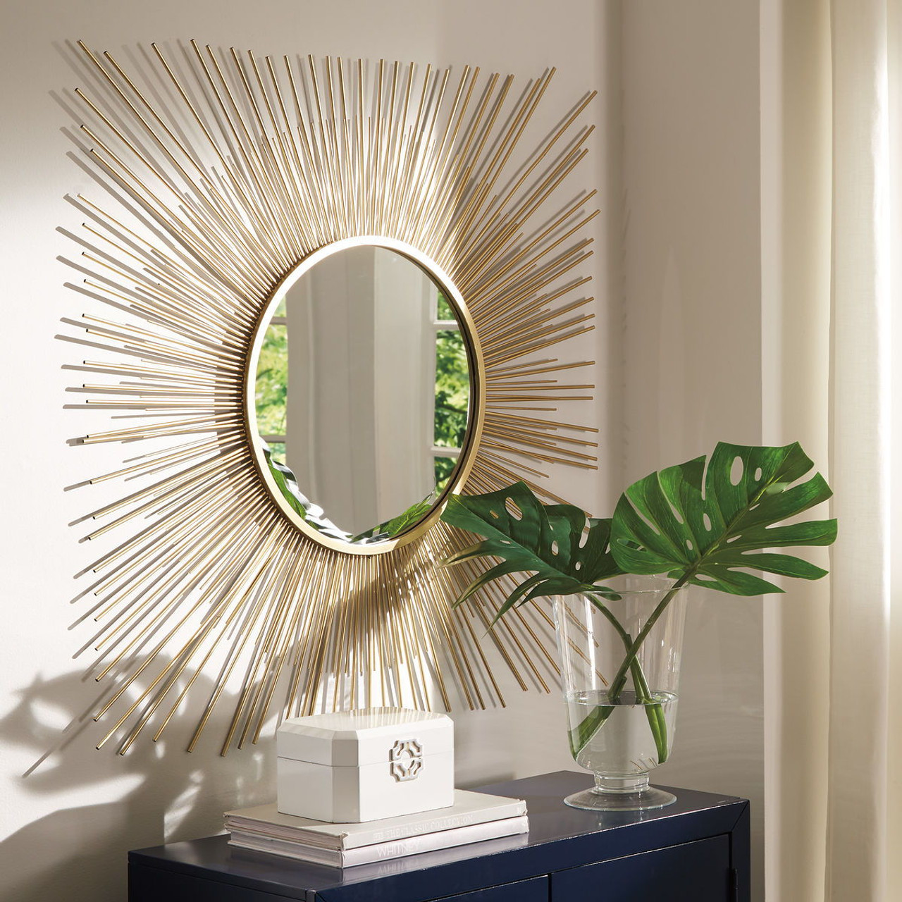 The Elspeth Gold Finish Accent Mirror is available at Complete Suite  Furniture, serving the Pacific Northwest.