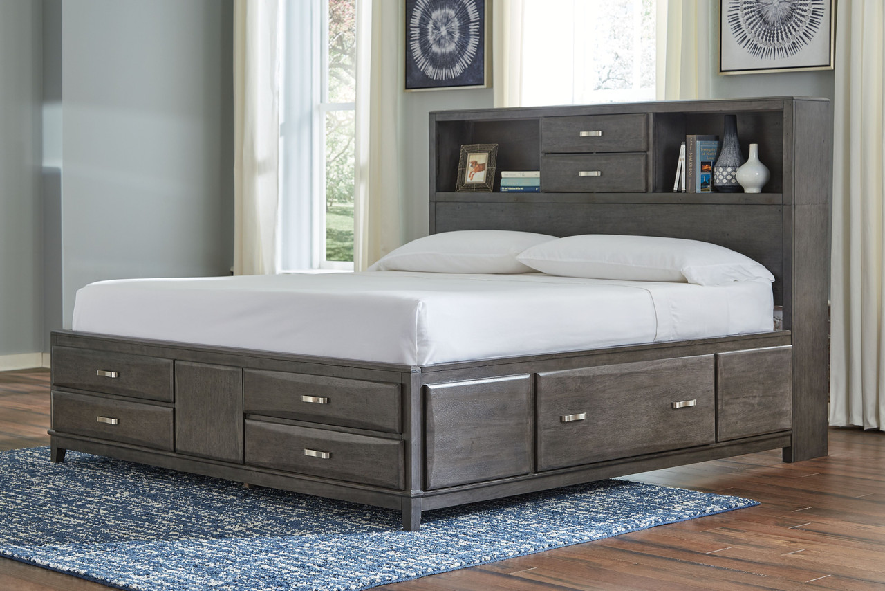 The Caitbrook Gray King Storage Bed With 8 Drawers is available at