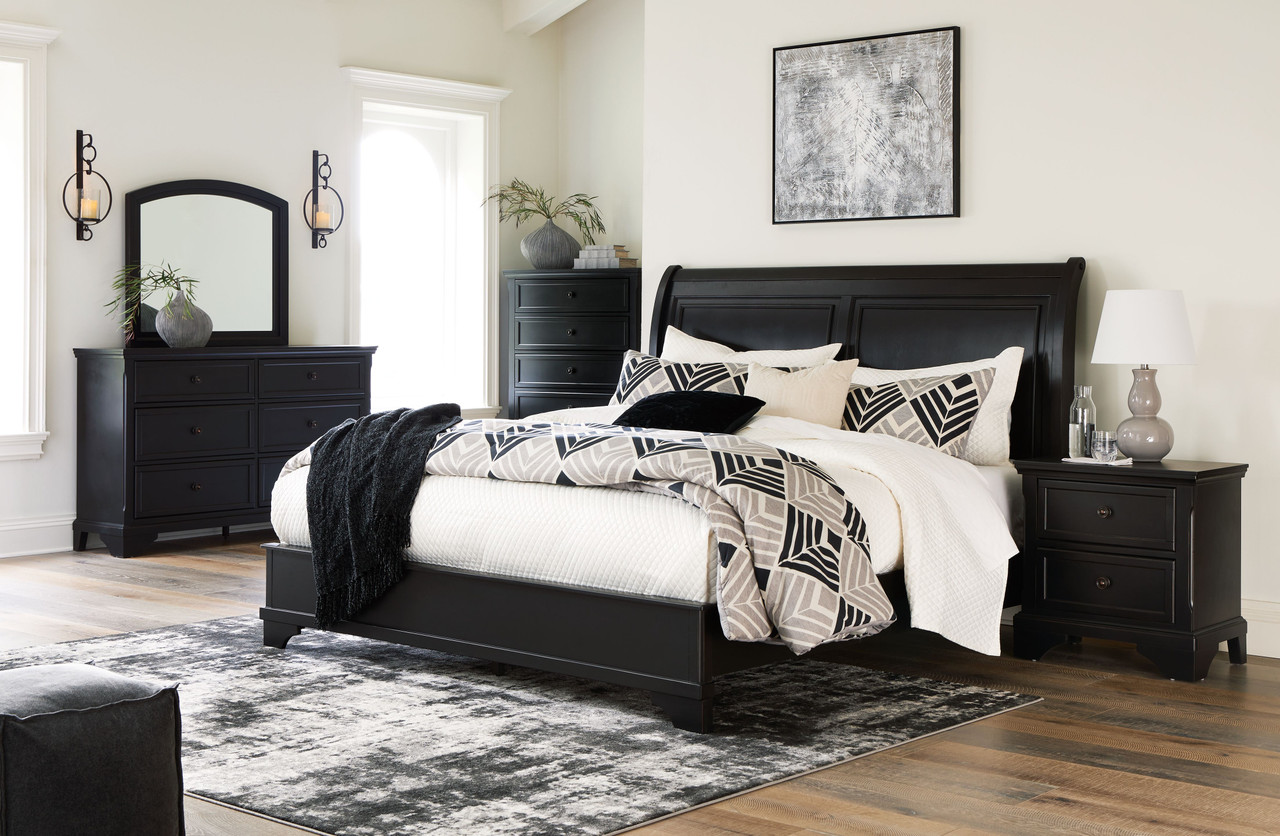 The Chylanta Black 4 Pc. Dresser, Mirror, Queen Sleigh Bed is available at  Complete Suite Furniture, serving the Pacific Northwest.