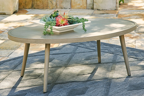 Swiss Valley Beige Oval Cocktail Table