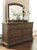 Flynnter Medium Brown 5 Pc. Dresser, Mirror, California King Panel Bed With 2 Storage Drawers