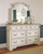 Realyn Two-tone 6 Pc. Dresser, Mirror, Chest, Queen Upholstered Bed