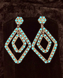 Sterling Silver and Turquoise
2.75 inches long
1.5 inches wide