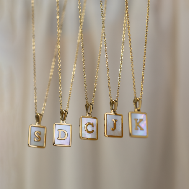 Gold framed initals