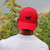 Black Lab Walking Needlepoint Performance Hat - Sunday Red