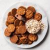 Scotch Oatmeal Cookies on plate with oats