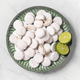 Key lime coolers on plate with sliced lime