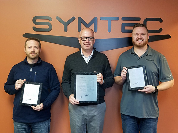 Inventors with awards from a corporate inventor recognition program