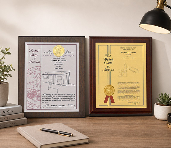 A selection of personalized patent plaques in premium wood finishes