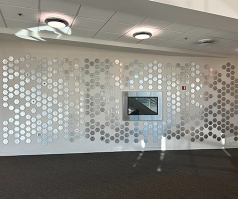 Custom patent wall displayed in a reception lobby