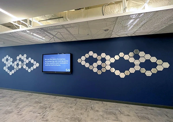 Completed custom patent wall installed in the client’s space