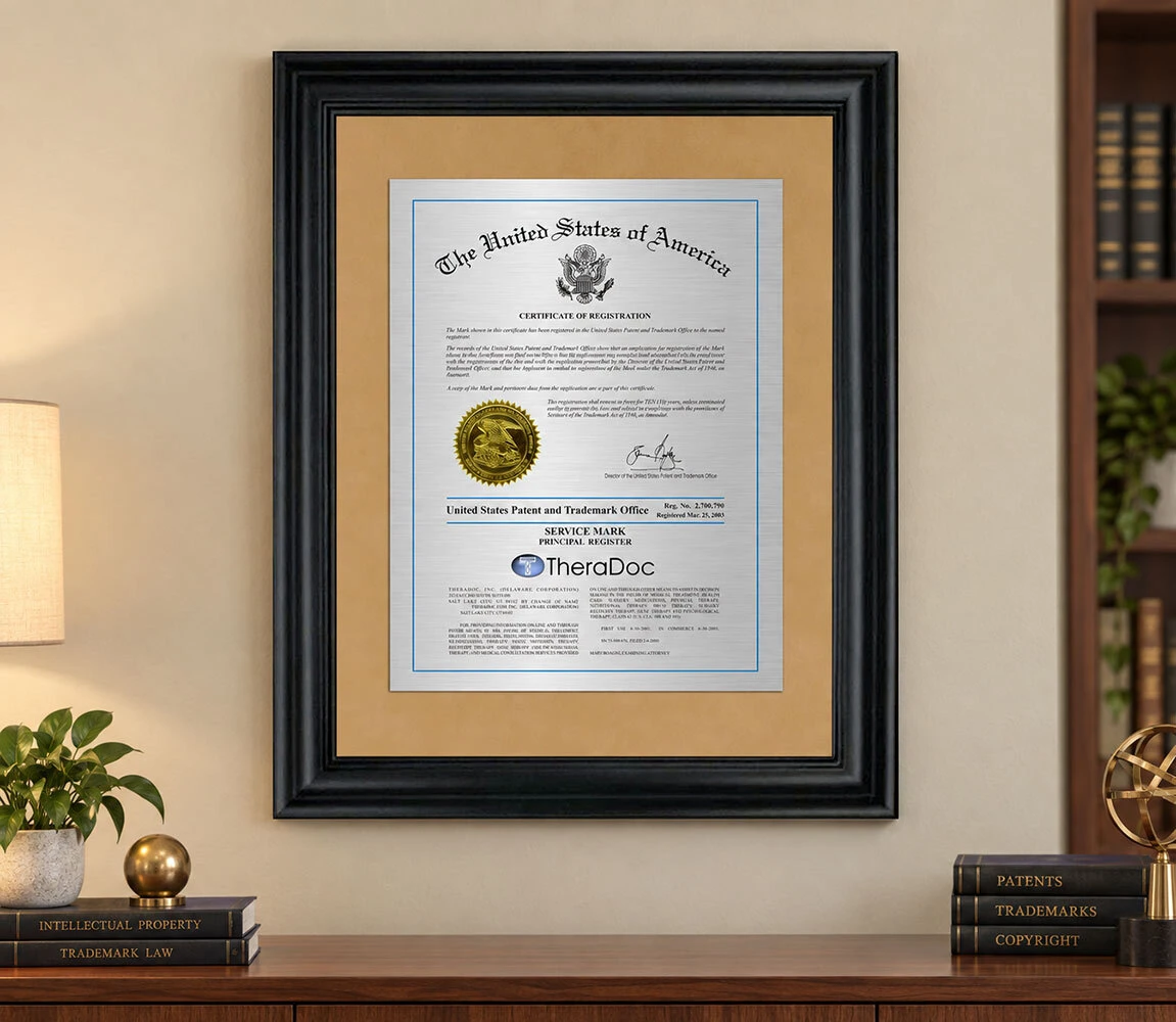A selection of personalized trademark plaques, frames, and certificates