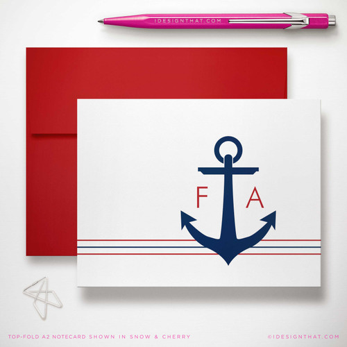 Anchor Monogram folded notecard showing navy anchor monogram and red border lines with a red envelope.