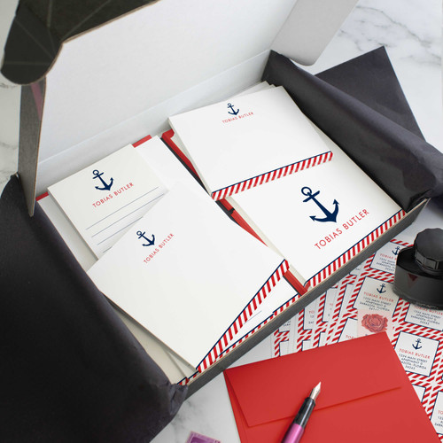 Nautical Anchor personalized stationery gift set in an open box with coordinated notecards, notepads, envelopes, and stickers.