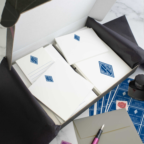 Diamond Monogram personalized stationery gift set in an open box with coordinated notecards, notepads, envelopes, and stickers.