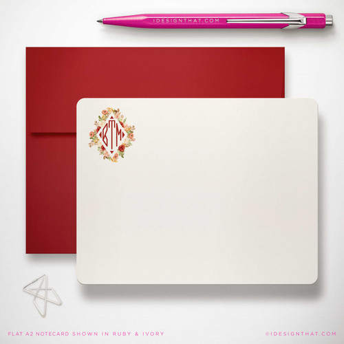 Floral Diamond flat notecard showing small floral diamond monogram with a red envelope.