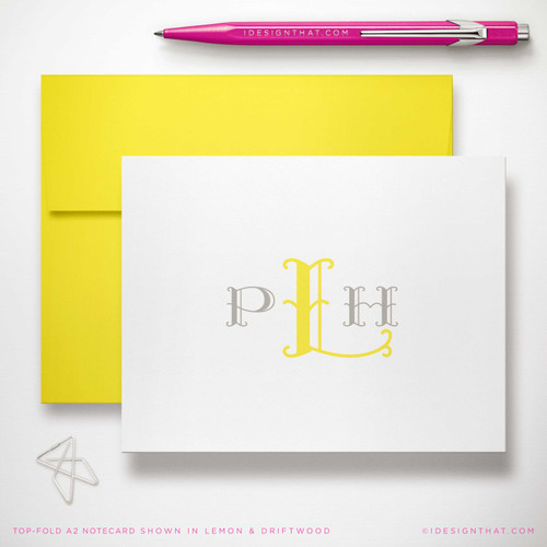 Monterey Monogram folded notecard showing two-color lettered monogram with a yellow envelope.