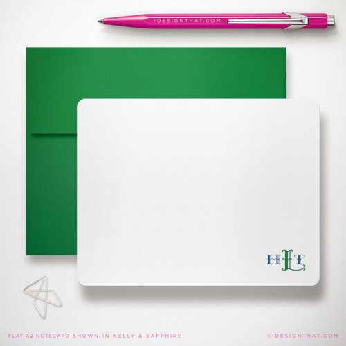 Monterey Monogram flat notecard showing small two-color monogram with a green envelope.