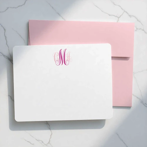 Traditional Script flat notecard showing small pink script monogram and rounded corners with a pink envelope.