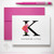 Floral Initial folded notecard showing large black floral initial and name with a pink envelope.