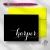 Holla Swash folded notecard with white Harper script on a black front, lemon-yellow envelope, pink pen and geometric paper clip.