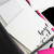 Close-up of personalized HOLLA SWASH notepads in the complete gift set