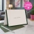 Personalized Modern Border folded note card standing open beside a coordinating envelope, showing the folded card construction.