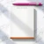 Modern Border personalized notepad with two names, green lettering, orange accent border, and roomy unlined writing space.