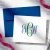 Custom Traditional Script folded stationery card with a green and blue three-initial monogram and coordinating deep blue envelope.
