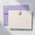 Ivory Traditional Script flat notecard with a purple three-initial monogram, rounded corners, and coordinating lavender envelope.