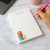 Personalized macaron list pad with colorful French macarons and a custom printed name
