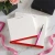 Two personalized square memo pads with professional name formatting, red accent borders, and wide unlined writing space.