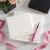 Personalized square notepad with the name at the bottom styled as a gift-ready stationery set