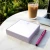 Lavender personalized square notepad with monogram, iced coffee, and laptop
